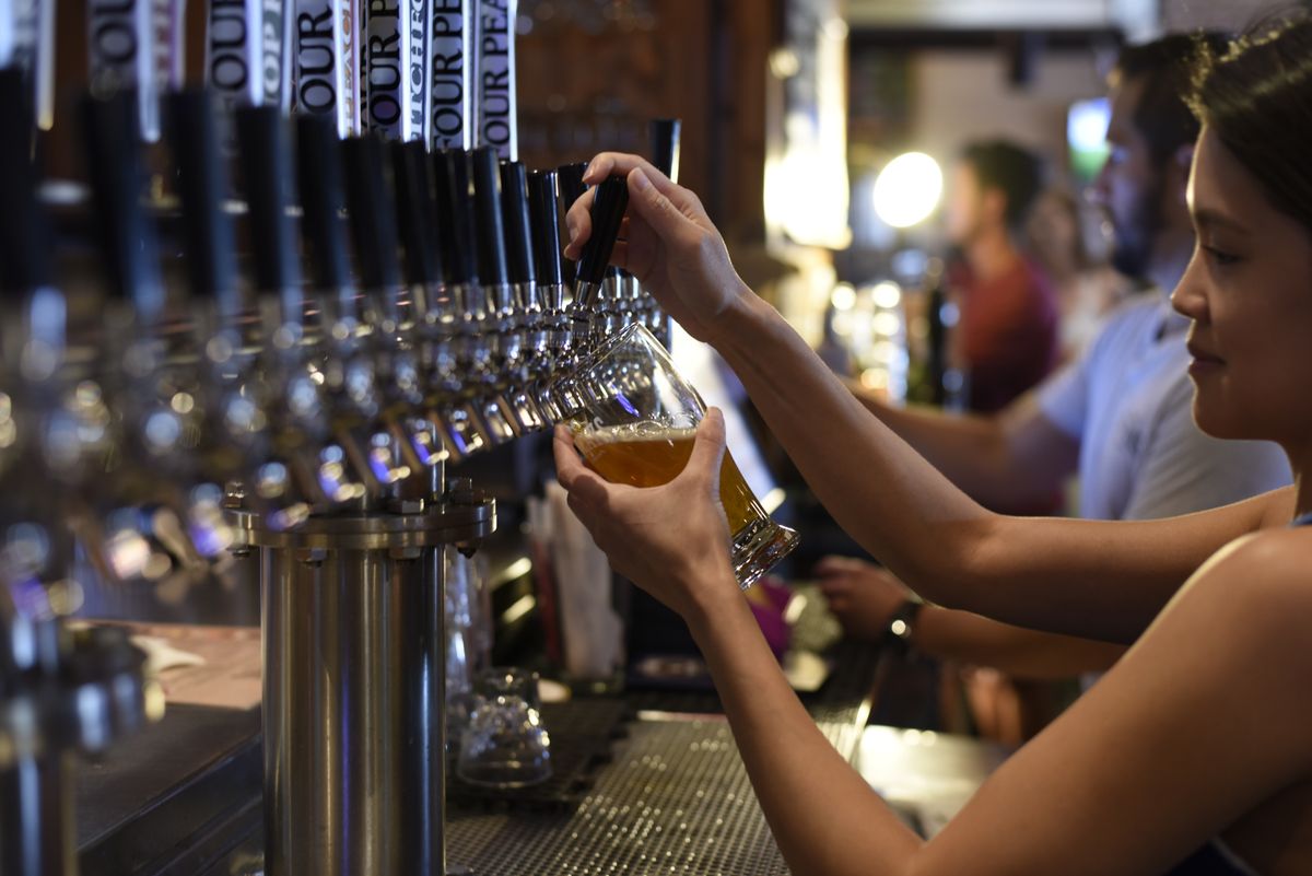A pint of beer on a bar